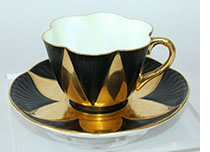 Shelley Dainty cup and saucer in black and gold alternating panels
